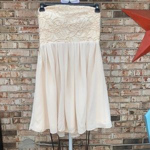 Strapless ivory dress with sequin top